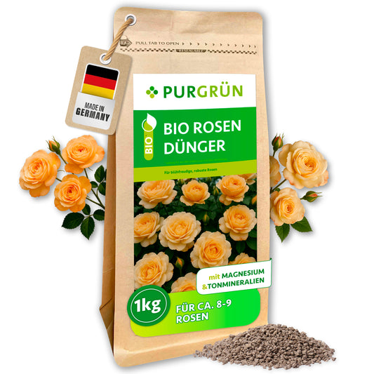 Purgrün Bio-Rosendünger, 1 kg, im wiederverschließbaren Papierbeutel mit sichtbarem Krümelgranulat und Rosenblüten.